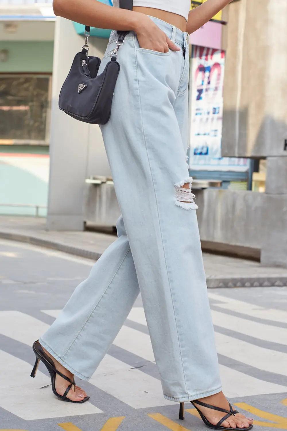 Distressed Straight Leg Jeans with Pockets.